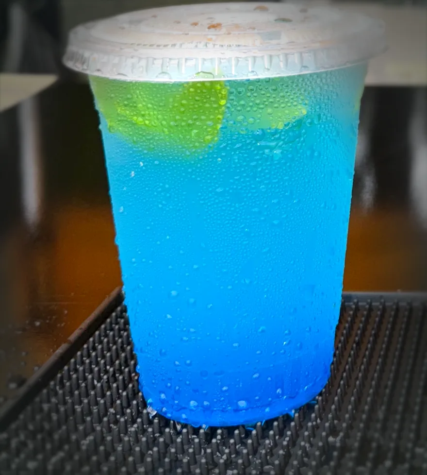 Ocean Breeze — a bright blue iced mocktail in a clear cup